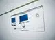 Control panel of a Vaillant heating system, featuring two digital displays showing temperature and operational settings, with buttons for functions and adjustments.